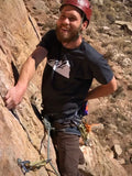 Climber wearing black and white Neon T-shirt (front)