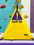 Yellow triangle commercial belay gate by Neon Climbing Accessories.